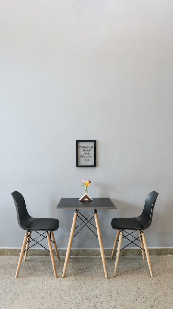 black couple dining set with yellow flower